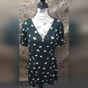 Green V neck floral print dress.